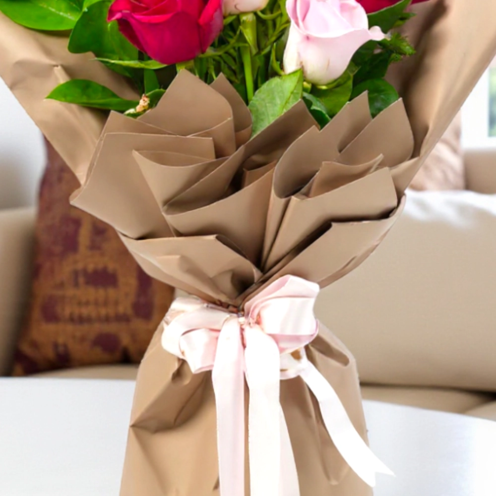 A bouquet of 6 red and Pink roses in a nice wrapping