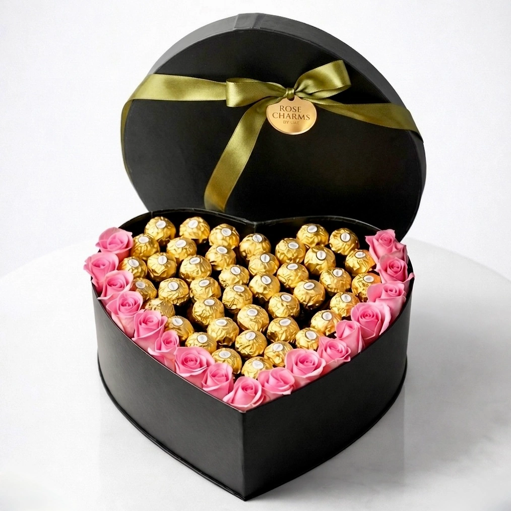 Luxury heart-shaped box with 21 pink roses and 41 Ferrero Rocher chocolates for romantic gifting