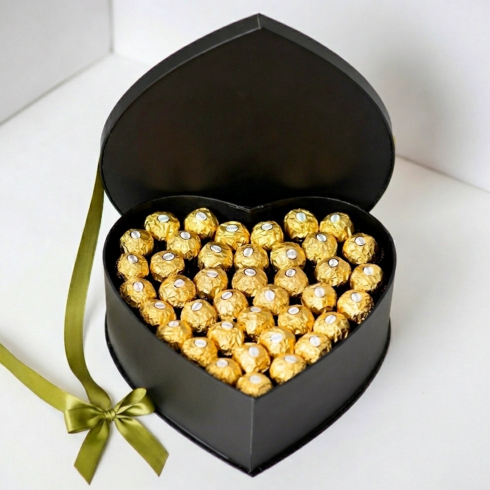 Luxury black heart-shaped box filled with 41 Ferrero Rocher chocolates arranged for elegant gifting